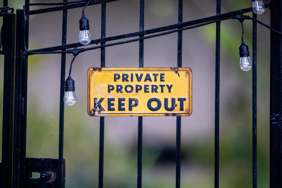 How to Appeal Your Property Tax Assessment A property tax assessment notice next to a small model house and a calculator
